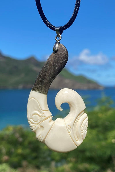 Tiki's hook necklace - Cannibal Art