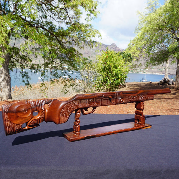 Hunting rifle on a pedestal - Cannibal Art