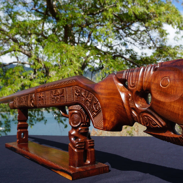 Hunting rifle on a pedestal - Cannibal Art