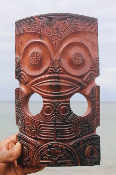 Tiki Mask (Tiki holding a child) - Cannibal Art