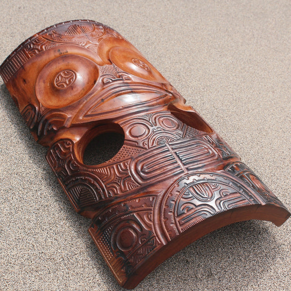 Tiki Mask (Tiki holding a child) - Cannibal Art