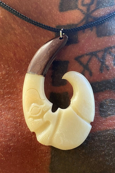 Tiki's hook necklace - Cannibal Art