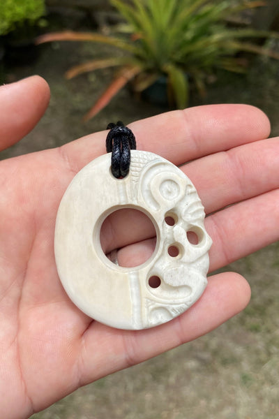 Tiki necklace - Cannibal Art