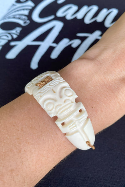 Hand-carved Etua bone bracelet with two Tikis, made in Nuku Hiva