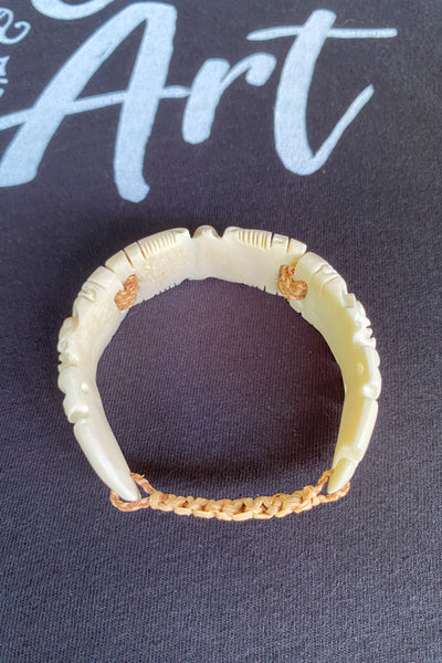 Hand-carved Etua bone bracelet with two Tikis, made in Nuku Hiva
