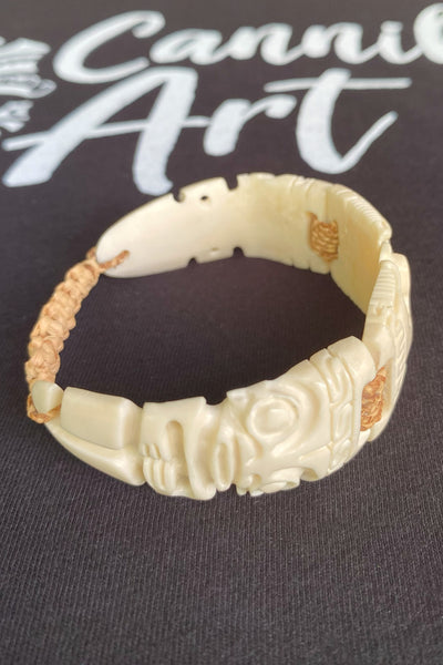 Hand-carved Etua bone bracelet with two Tikis, made in Nuku Hiva