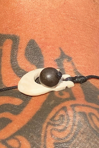 Tiki necklace