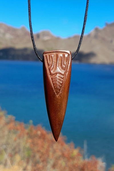 Marquesan wooden pendant carved on Nuku Hiva Island