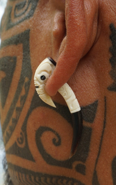 Marquesan earrings carved in horn and cows bone
