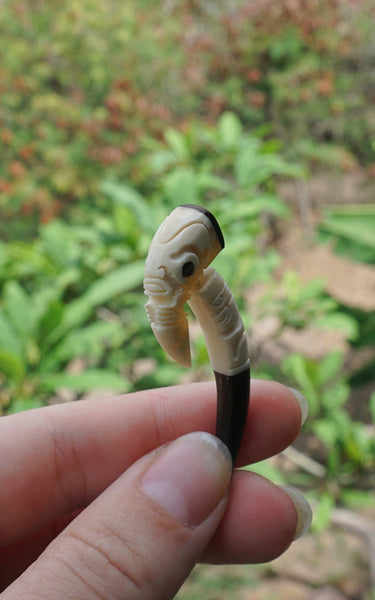 Marquesan earrings carved in horn and cows bone