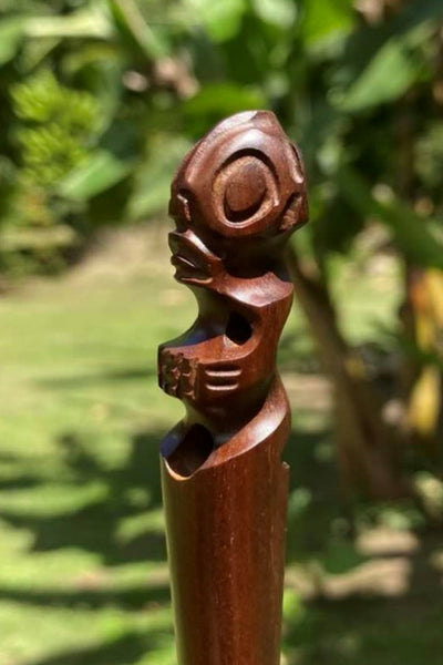 Tiki hair pick