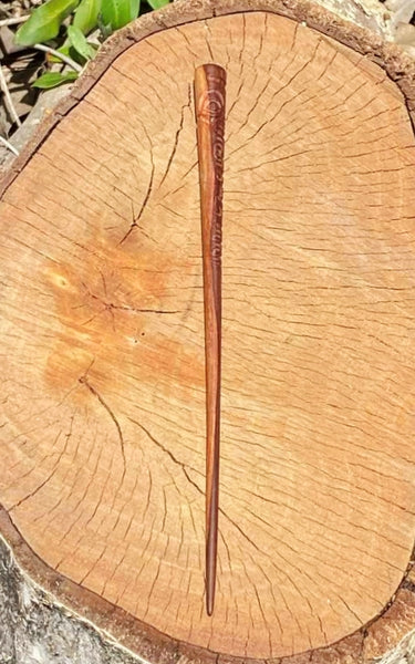 Tiki hair pick