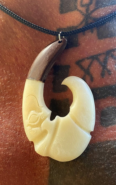 Tiki's hook necklace - Cannibal Art
